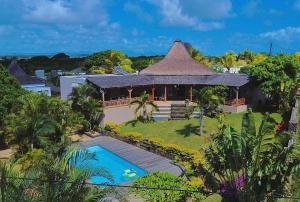 an aerial view of a house with a swimming pool at The Secret Oasis Villa in Cap Malheureux