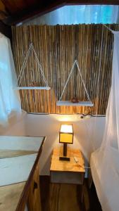 Lova arba lovos apgyvendinimo įstaigoje Mano a Mano Eco Hostal