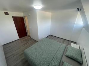 Giường trong phòng chung tại La Casuta Marginea