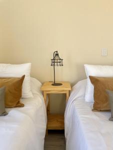 Postel nebo postele na pokoji v ubytování Altos del Peñón