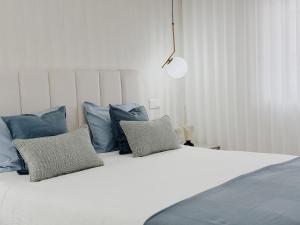 Ένα ή περισσότερα κρεβάτια σε δωμάτιο στο Seanest View Apartment