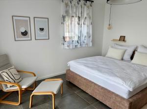 Postel nebo postele na pokoji v ubytování CHALET HOUBOVÝ VRCH