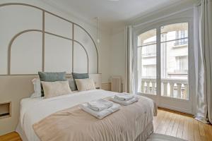 Ένα ή περισσότερα κρεβάτια σε δωμάτιο στο Maison Scheffer