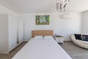 Katil atau katil-katil dalam bilik di 3 Bedroom-Ocean View Villa with Private Pool-Yalikavak-Bodrum