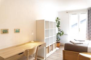 Χώρος καθιστικού στο Appartement cosy au coeur de Chambéry