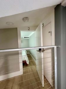 a walk in closet with a mirror in a room at Tiny Private Room #2 in Shared 5BR House with Other Guests in Austin