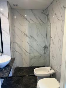 Ένα μπάνιο στο Apart hotel Alsina