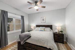 a bedroom with a bed and a ceiling fan at Bear Lake Bliss in Bear Lake