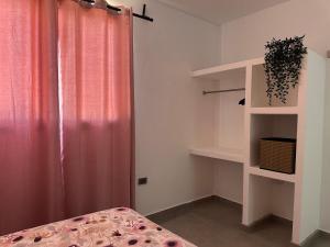 Postel nebo postele na pokoji v ubytování Apartamento Entre Playas 2 con piscina + 15 fotografií