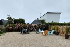 Zahrada ubytování Résidence L09-tregastel - Vacances à quelques pas de la mer et des commerces MAE-4871