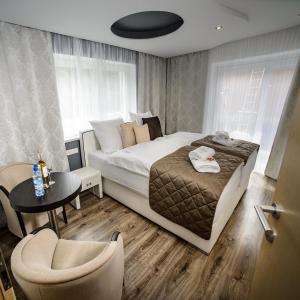 Ein Bett oder Betten in einem Zimmer der Unterkunft Landhaus Ambachhof