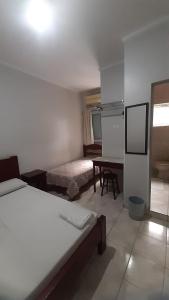 Postel nebo postele na pokoji v ubytování Apeninos Suites Basicas + 20 fotografií