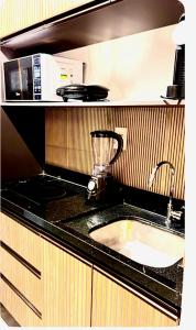 Dapur atau dapur kecil di Studio Art - Apartamento climatizado - Prédio a beira-mar, com jacuzzi e piscina - Praia de Armação
