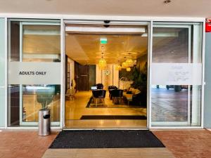 a store front door with a vase in front of it at Joy City Stay Memorandului 5 in Timişoara +34 photos