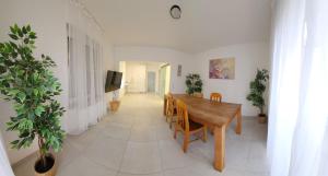 a dining room with a wooden table and chairs at 3 Zimmer Wohnung in Borken Zentrum in Borken