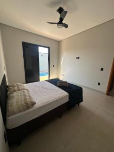 Postel nebo postele na pokoji v ubytování Belíssima Casa de Piscina + 10 fotografií