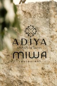 Um certificado, prêmio, placa ou outro documento exibido em Adiya Signature Hotel - Adults only