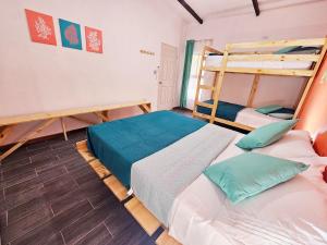 En eller flere senge i et værelse på Cara Coral, un oasis en la Selva + 21 billeder