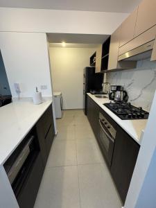 Η κουζίνα ή μικρή κουζίνα στο Premium apartment in Miraflores with rooftop pool