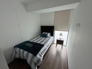 Ένα ή περισσότερα κρεβάτια σε δωμάτιο στο Premium apartment in Miraflores with rooftop pool