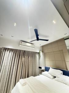 Ένα ή περισσότερα κρεβάτια σε δωμάτιο στο Blossom Exotica Luxury Stay +40 φωτογραφίες