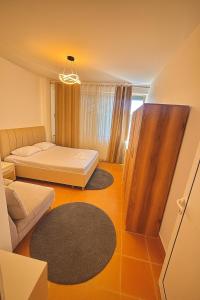 Ένα ή περισσότερα κρεβάτια σε δωμάτιο στο DSA Apartment