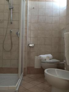 Koupelna v ubytování Hotel Bacco + 14 fotografií
