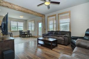 a living room with a couch and a table at Salida - Monarch Family Getaway! in Monarch