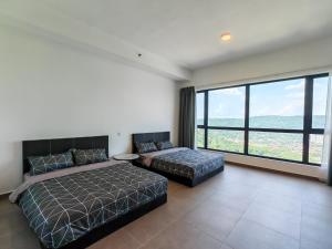 a bedroom with a bed and a couch and large windows at Mossaz minimalist studio 3 in Petaling Jaya +25 photos