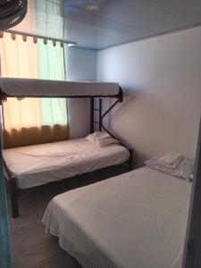 Postel nebo postele na pokoji v ubytování Espectacular apartamento en Girardot