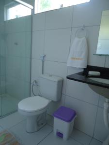 Ένα μπάνιο στο Casa em Condomínio na Praia de Pirangi RN