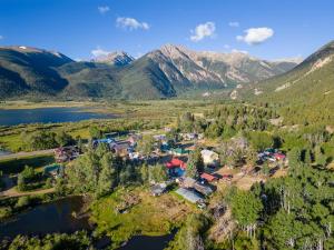 an aerial view of a resort in the mountains at Historic Boho Brothel Lake Retreat Fast Wifi in Twin Lakes
