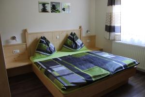 Ліжко або ліжка в номері Appartement Höll