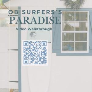 a sign on the side of a house with a window at Luxe Ob Retreat Sauna, Bikes & Beach Nearby in San Diego