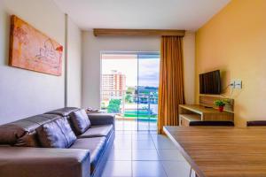 Телевизор и/или развлекательный центр в Riviera Park Hotel - Park Aquático é Piscinas 24 horas