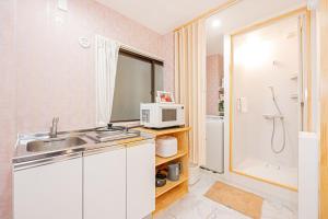 Ένα μπάνιο στο Ueno home2 10-minute walk from Ueno Station, 4-minute walk from Inaricho Station, 10-minute walk to Asakusa, 1F +15 φωτογραφίες