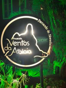 a neon sign for aeria kerricolis atlanta at Pousada Ventos da Atalaia in Fernando de Noronha