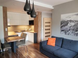 Posedenie v ubytovaní Apartament Ornak