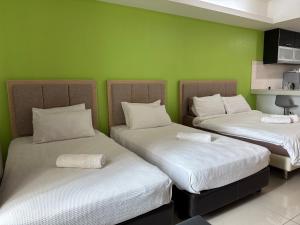 Ένα ή περισσότερα κρεβάτια σε δωμάτιο στο The Viana Apartment 7