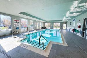 a large indoor swimming pool in a building at Hawthorn Extended Stay by Wyndham Mount Laurel Moorestown in Mount Laurel