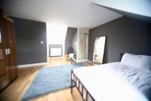 Ένα ή περισσότερα κρεβάτια σε δωμάτιο στο Hullidays 4 bed Hessle House +3 φωτογραφίες