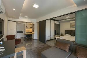 Fotografie z fotogalerie ubytování One-Bedroom Apartment and Luxury Penthouse in Courtyard Long Beach Complex v destinaci Kyperounda