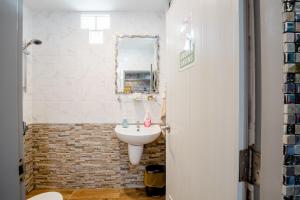 a bathroom with a sink and a mirror at Double Studio with Balcony & Private Bath by Smile Loft in Ban Na Song +39 photos