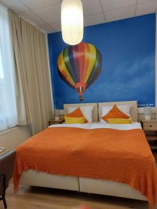 Ένα ή περισσότερα κρεβάτια σε δωμάτιο στο Renatus Apartments