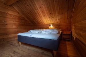 Postel nebo postele na pokoji v ubytování Beito Resort Hytter