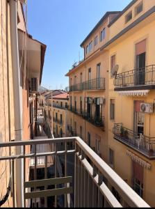 a view of an alley between two buildings at B&B PierGaia in Santa Maria di Castellabate