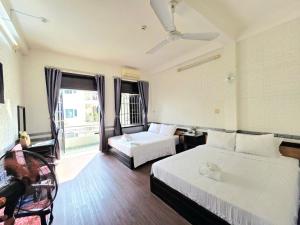 Postel nebo postele na pokoji v ubytování Four Seasons Hotel Nha Trang