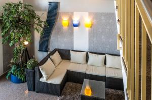 Posezení v ubytování Median Hotel Garni