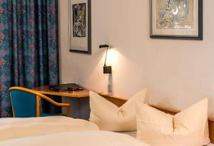 Postel nebo postele na pokoji v ubytování Median Hotel Garni