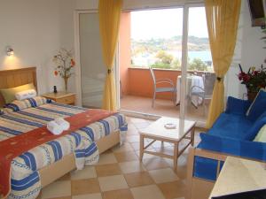 A bed or beds in a room at Sea View Resorts & Spa